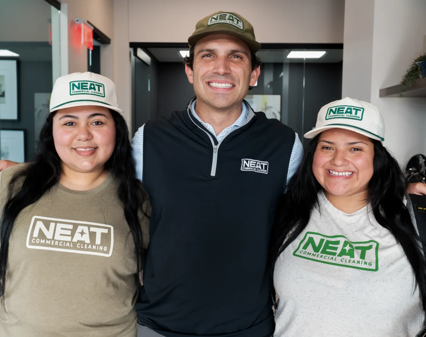 The Neat Commercial Cleaning team in branded gear serving Washington County, AR